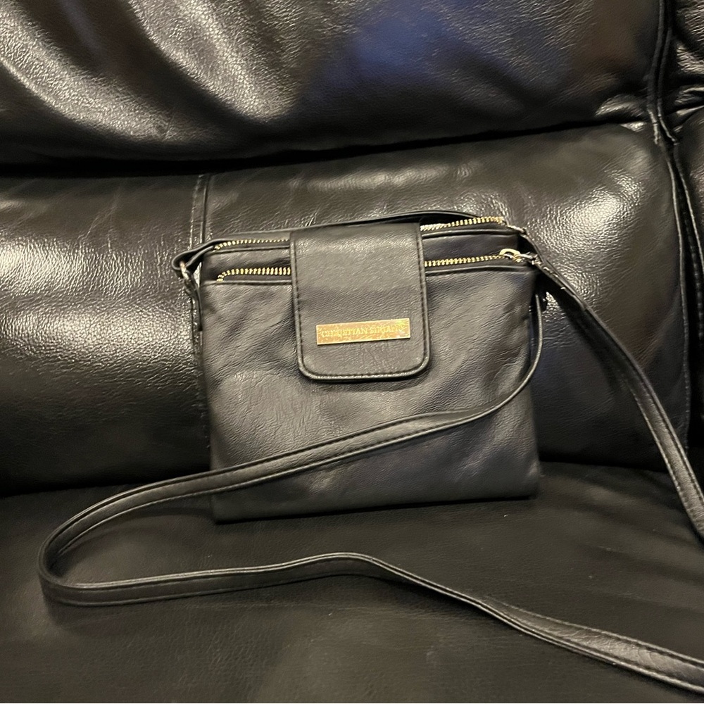Christian Soriano black shoulder purse. Used but still in good condition